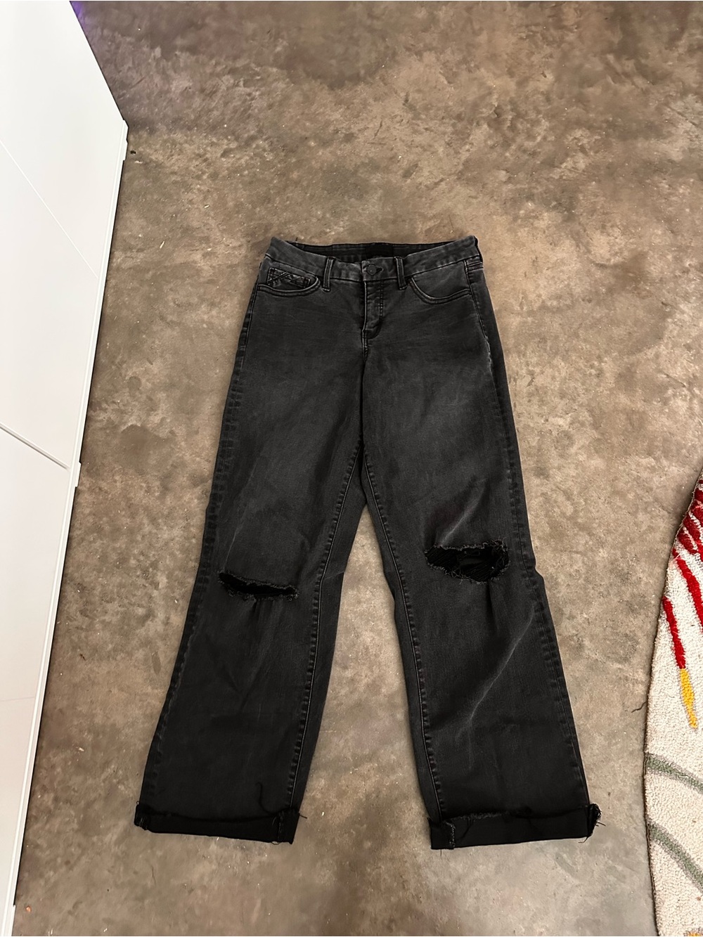 Buckle Black Straight-Leg Jeans with Knee Rips